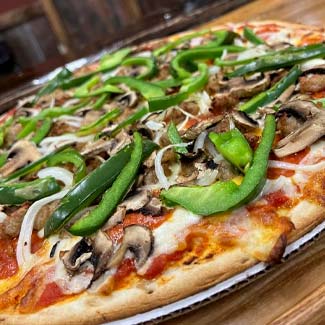 Homemade supreme pizza served from food menu at Maloney's Kaukauna WI bar and grill