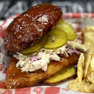 Nashville hot breaded chicken sandwich served from food menu at Maloney's Kaukauna WI bar and grill