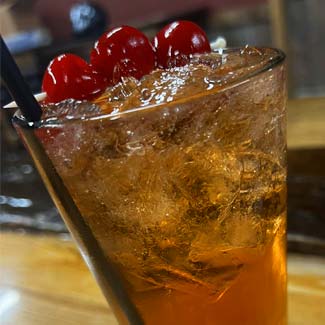 Tall whiskey and brandy old fashion cocktails served from bar menu at Maloney's Kaukauna WI bar and grill